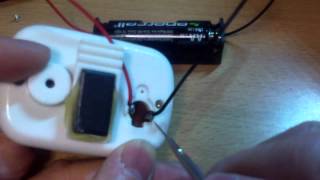 Replacing a quick draining button cell on a timer with a AA battery [upl. by Bautram]