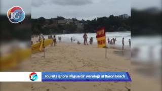 Tourists ignore lifeguards at Phukets beaches [upl. by Carolina]