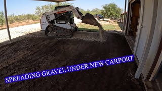 How to spread gravel under existing carport bobcatt630 skidsteer [upl. by Munmro26]