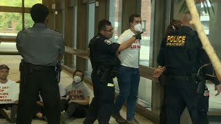 Protesters of IsraelHamas war handcuffed after refusing to leave Boston federal building [upl. by Ferris349]