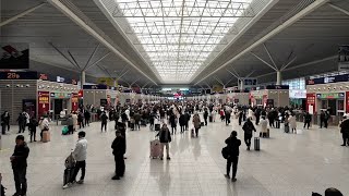 GLOBALink  Experiencing Spring Festival travel rush at railway hub in central China [upl. by Knitter]