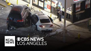 Reckless driver violently crashes into multiple cars after losing control during pursuit [upl. by Ekrub]