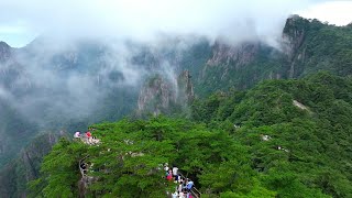 GLOBALink  Overseas travel merchants impressed by Chinas Huangshan Mountain [upl. by Eilah]