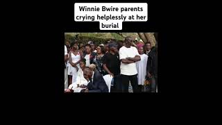 Winnie Bwire parents crying helplessly at her burial [upl. by Ynafetse]