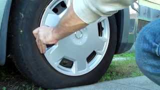 Replacing the Hubcap on a Nissan Versa [upl. by Trebor]