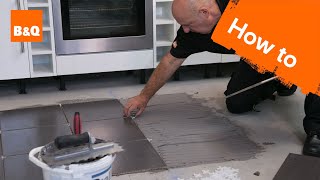 How to tile a floor part 2 laying the tiles [upl. by Smiley]