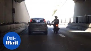 Motorcycle kicks car on the highway and immediately falls over [upl. by Anelrac]