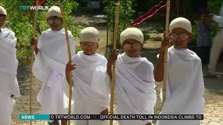 Indian children dress as Gandhi to celebrate his 150th birthday [upl. by Cozza]