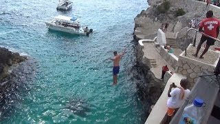 Tourists Join CliffJumping Craze That Kills Dozens Each Year [upl. by Reivaxe999]