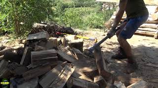 Splitting firewood with Fiskars x27 and a sledge hammer [upl. by Eecart]