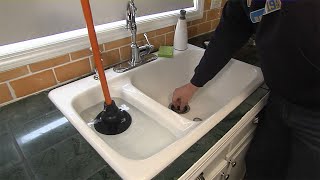 How to Fix a Clogged Drain [upl. by Newberry785]