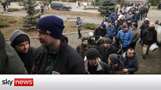 Ukraine Invasion Volunteers queue to join Ukrainian army [upl. by Macleod742]