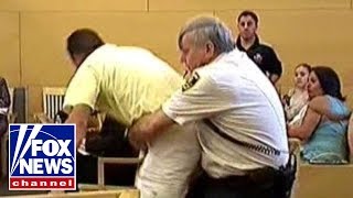 Disorder in the court Man lunges at suspected killer [upl. by Aneetsirk]