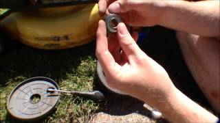 Lawnmower throwing a wheel replacing bearings  062 [upl. by Merceer872]