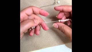 השחלת פנינים חלק 3 knotting pearls part 3 [upl. by Anawt]