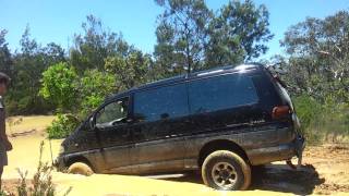 Mitsubishi Delica off road crossing water and mud [upl. by Inalel]