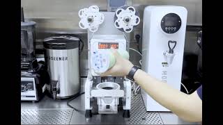 Automatic cup sealing machine [upl. by Ellenhoj]