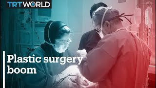 Plastic surgery booms in Iran during pandemic [upl. by Latashia768]