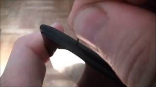 How To Remove The Sim Card Tray And Install A SIM Card On An HTC 8X Smartphone [upl. by Nospmas632]