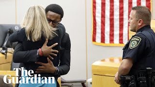 Botham Jeans brother hugs exofficer Amber Guyger after sentencing [upl. by Roper]