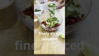 Making Strawberry Avocado Salsa healthysnacks [upl. by Drusie377]