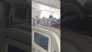 Passenger opens emergency exit door during flight Shorts [upl. by Noyr860]