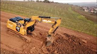 Weinberge rigolen mit Caterpillar 326F [upl. by Siduhey]