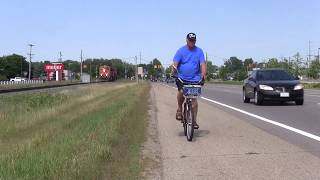 JESUS ACCOMPANIES NORM RASMUSSEN ON A BICYCLE DISTRIBUTING REAL LIFE STORIES TESTIMONY BOOKS [upl. by Ahsikram]