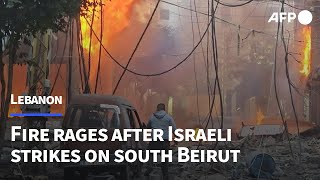 Fire rages after Israeli strikes on south Beirut  AFP [upl. by Hpeosj895]