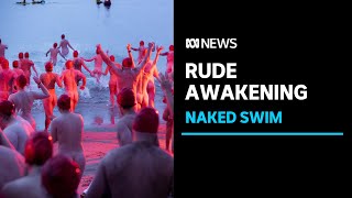 Thousands brave morning freeze to bare all at Dark Mofo nude swim  ABC News [upl. by Enidualc]