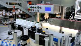 Automatic Labelling Machine Applying Labels to Dairy Industry [upl. by Atelra476]