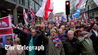 Thousands of Tommy Robinson supporters march through London [upl. by Lil16]