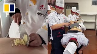 Trainee chefs slice potatoes on classmates’ backs sparking safety concerns [upl. by Tarttan]