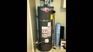 Rheem gas water heater with delayed ignition problem  explosion and blue flame at vent [upl. by Erotavlas]