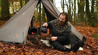 Bushcraft trip  rainy day in a hot tent next to large lake making firewood and cooking a meal etc [upl. by Letnahs]