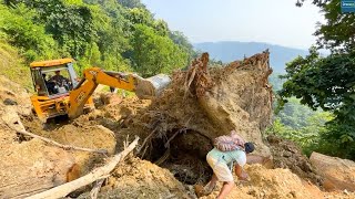 Epic StruggleJCB Backhoe vs Massive Sal Tree Root on Mountain Road [upl. by Aicire]