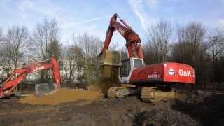 Zwei OampK RH 125 Bagger mit OilQuick im Einsatz [upl. by Zsamot]