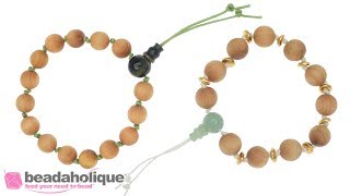 How to Make a Meditation Bracelet with Aromatic Wood Beads and a Gemstone Guru Bead [upl. by Hatch]