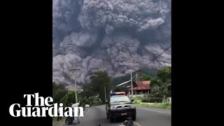 People flee as black cloud of volcanic ash towers above them in Guatemala [upl. by Maisey]