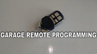 Garage door remote  How to program a replacement [upl. by Eilarol]