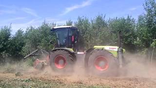 Claas Xerion met bosfrees [upl. by Servais]