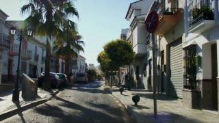 Driving through the main street of Manilva Andalucia Spain [upl. by Gabriellia]