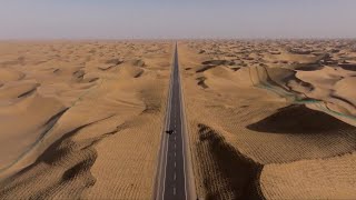 New highway opens in largest desert in Chinas Xinjiang [upl. by Littman]