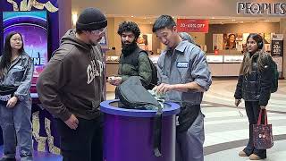 Free Money Grabbing Frenzy in Eaton Centre Toronto [upl. by Lebatsirc]