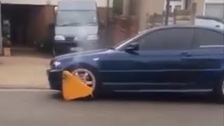 BMW with parking boot refuses to stop for anyone [upl. by Notlil]