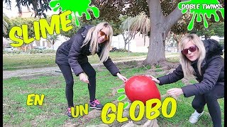 Haciendo Slime dentro de un GLOBO GIGANTE Making slime with ballon  Doble Twins [upl. by Enwad]