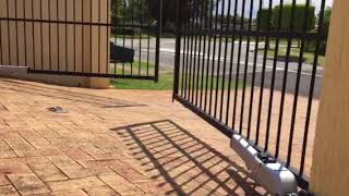 Oz Automation installation of FAAC 413 swing gate operator [upl. by Moorish470]