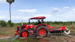 kubota m6040 plow the sand fields  คูโบต้า m6040 [upl. by Aelram250]