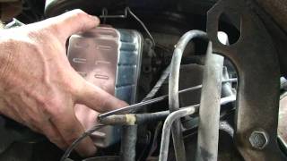 CHANGING DIESEL FUEL FILTER 1988 GMC 62 DIESEL VAN [upl. by Elledoj]