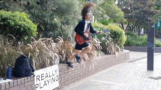 ACDC  Kicked In The Teeth By Angus Young Street Performer [upl. by Raymond823]